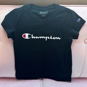 Champion Short sleeve T shirt-size 5. Black w/white logo.